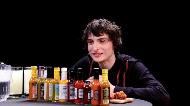 S23:E06 - Finn Wolfhard Embraces Insanity While Eating Spicy Wings