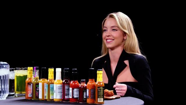 S23:E01 - Sydney Sweeney Endures a Nightmare While Eating Spicy Wings